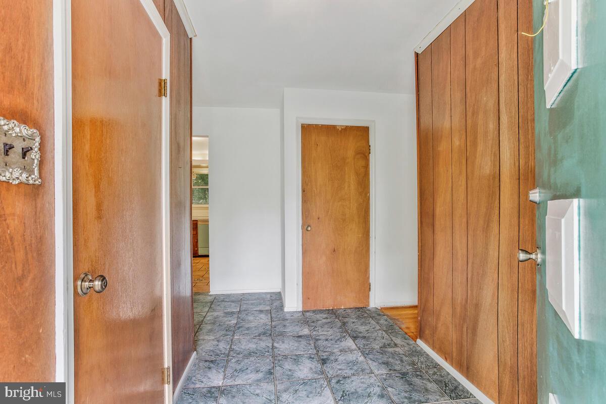 12412 Palermo Drive Silver Spring, MD 20904 - Photo 6 of 43 a view of a bathroom with a shower and a door
