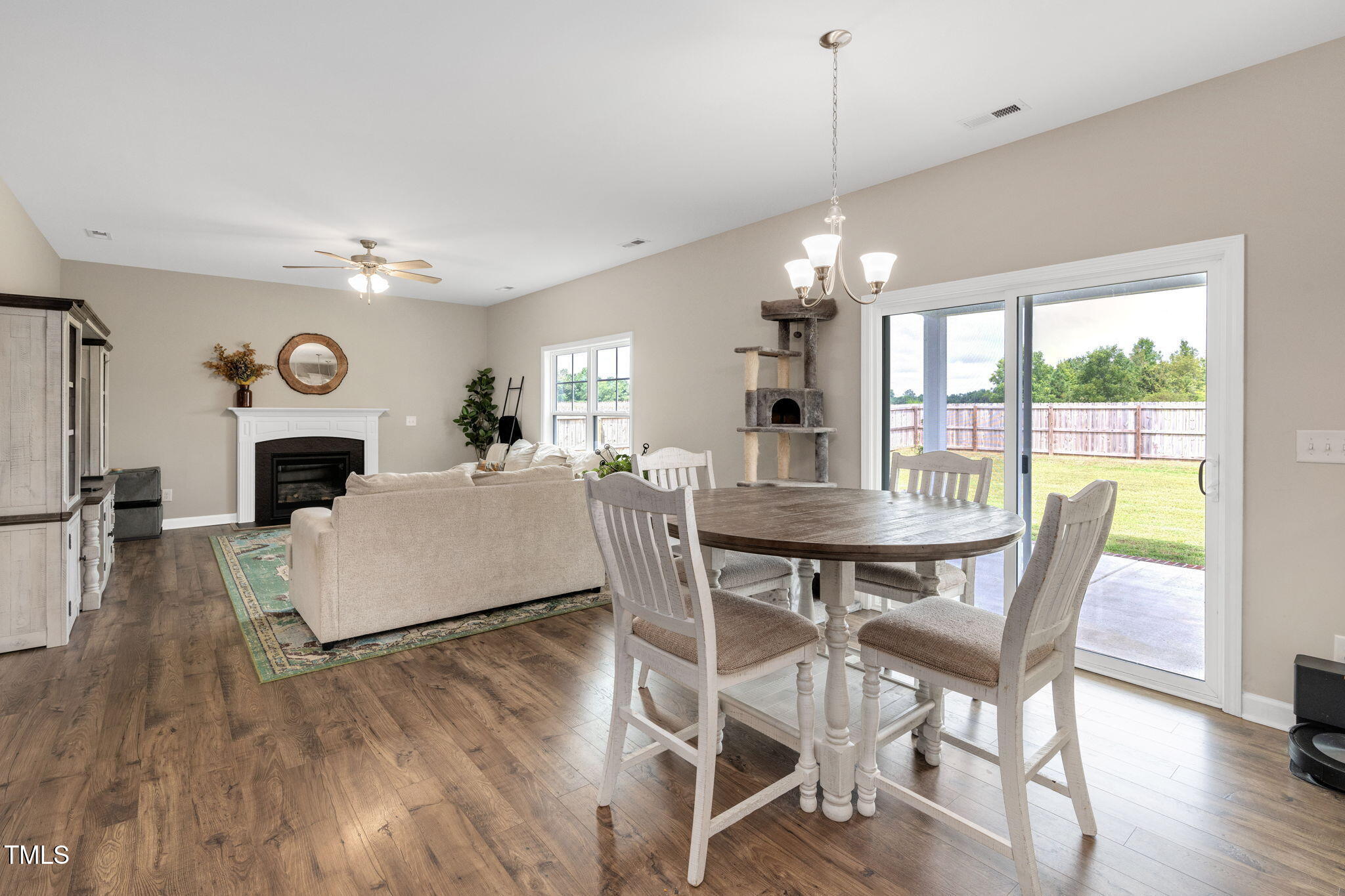 40 Kenbridge Lane Princeton, NC 27569 - Photo 14 of 36 a view of a dining room with furniture window and wooden floor
