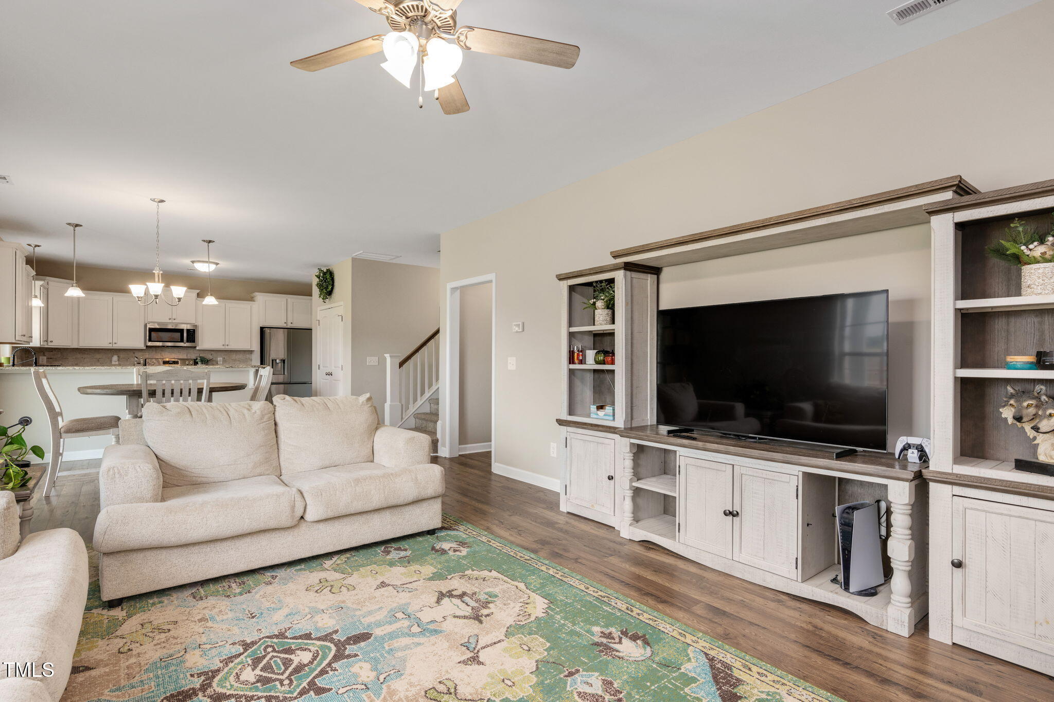 40 Kenbridge Lane Princeton, NC 27569 - Photo 17 of 36 a living room with furniture and a flat screen tv