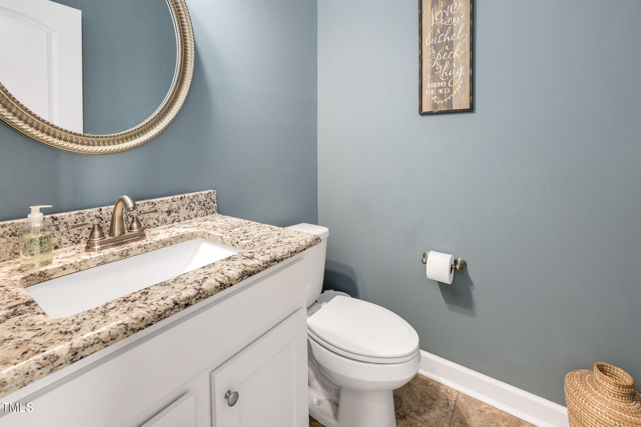40 Kenbridge Lane Princeton, NC 27569 - Photo 18 of 36 a bathroom with a granite countertop toilet and a sink