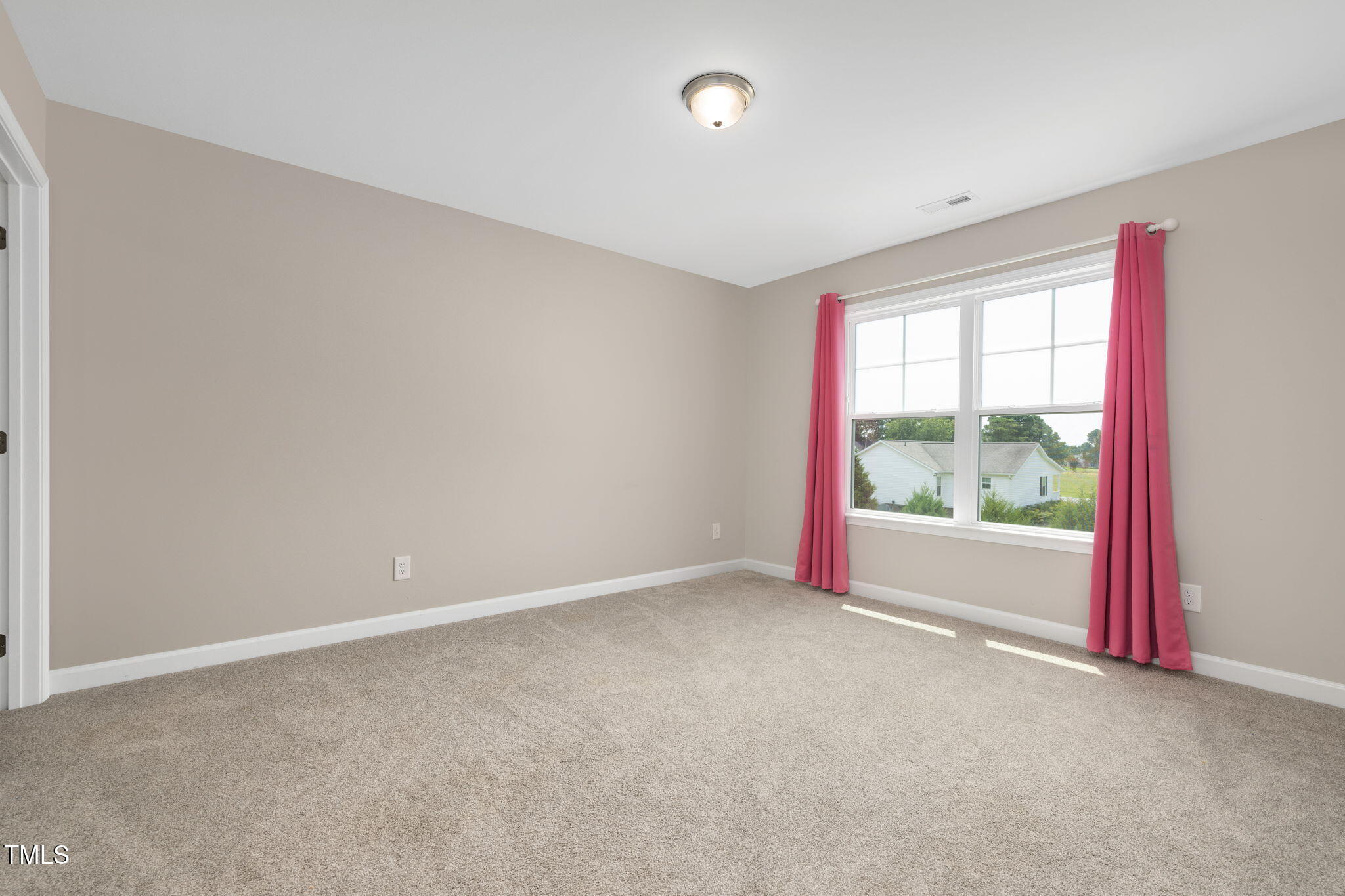 40 Kenbridge Lane Princeton, NC 27569 - Photo 19 of 36 an empty room with an empty space and windows