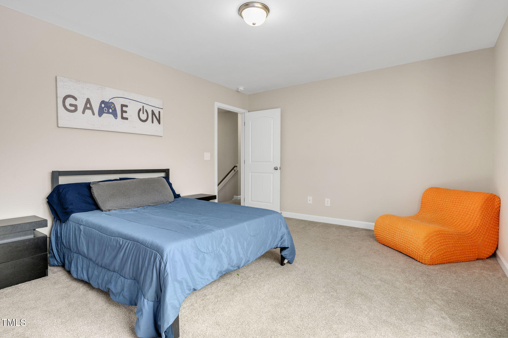 40 Kenbridge Lane Princeton, NC 27569 - Photo 22 of 36 a bedroom with a bed and a couch