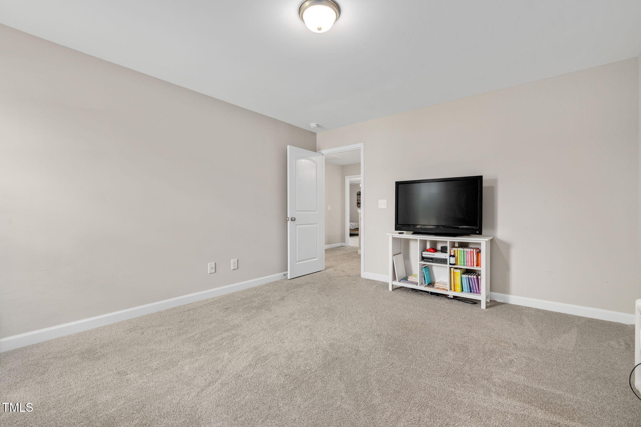40 Kenbridge Lane Princeton, NC 27569 - Photo 24 of 36 a room with furniture and flat screen tv