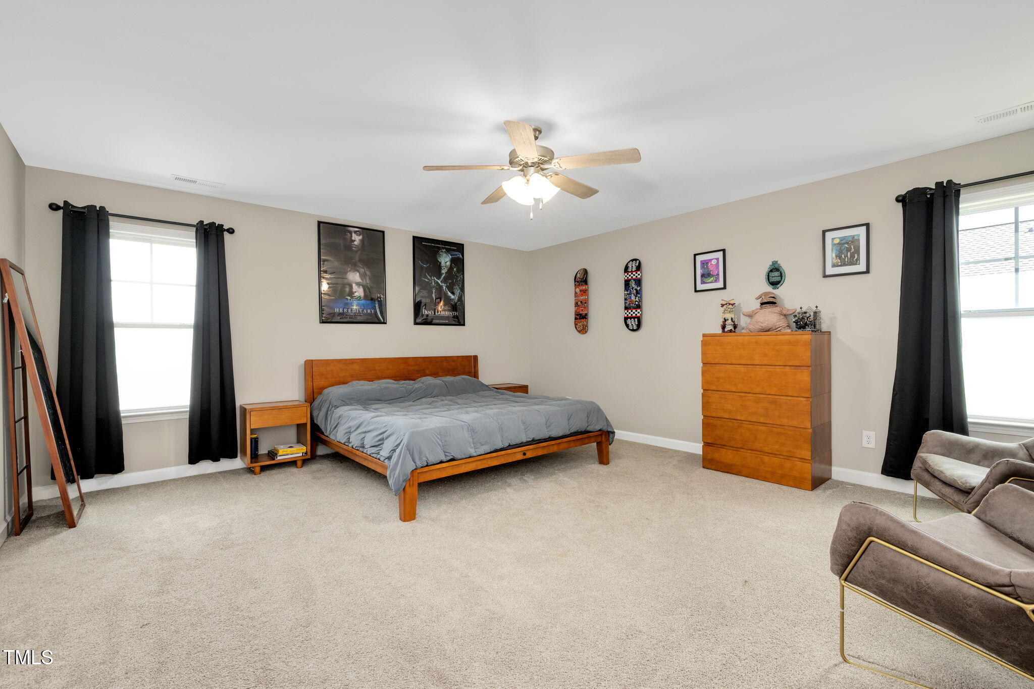 40 Kenbridge Lane Princeton, NC 27569 - Photo 26 of 36 a bedroom with a bed and a couch