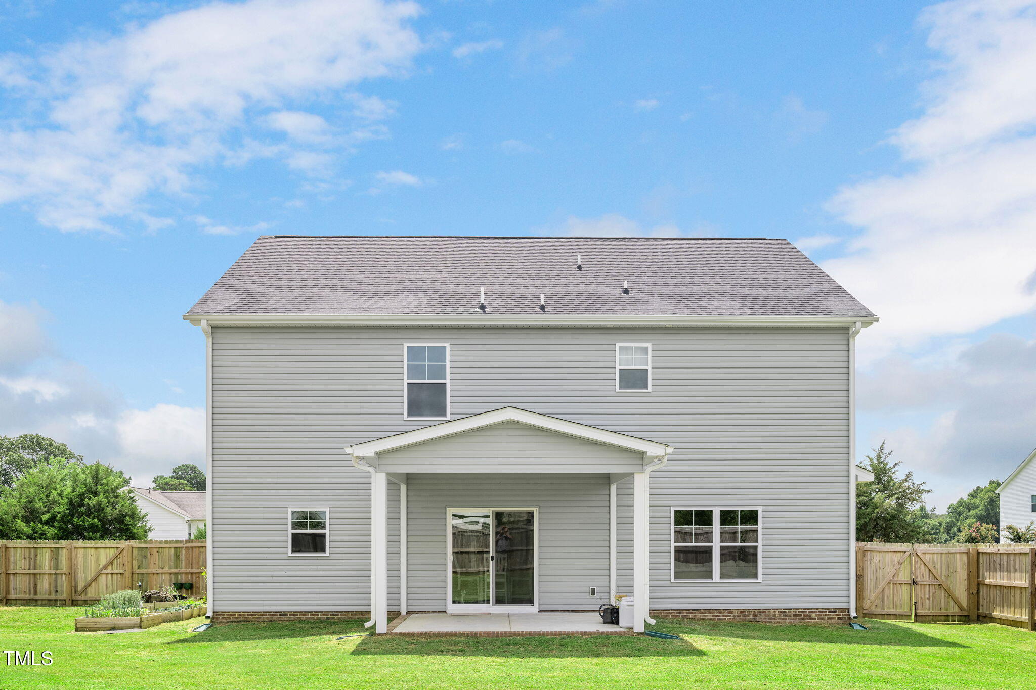 40 Kenbridge Lane Princeton, NC 27569 - Photo 31 of 36 a front view of a house with a yard