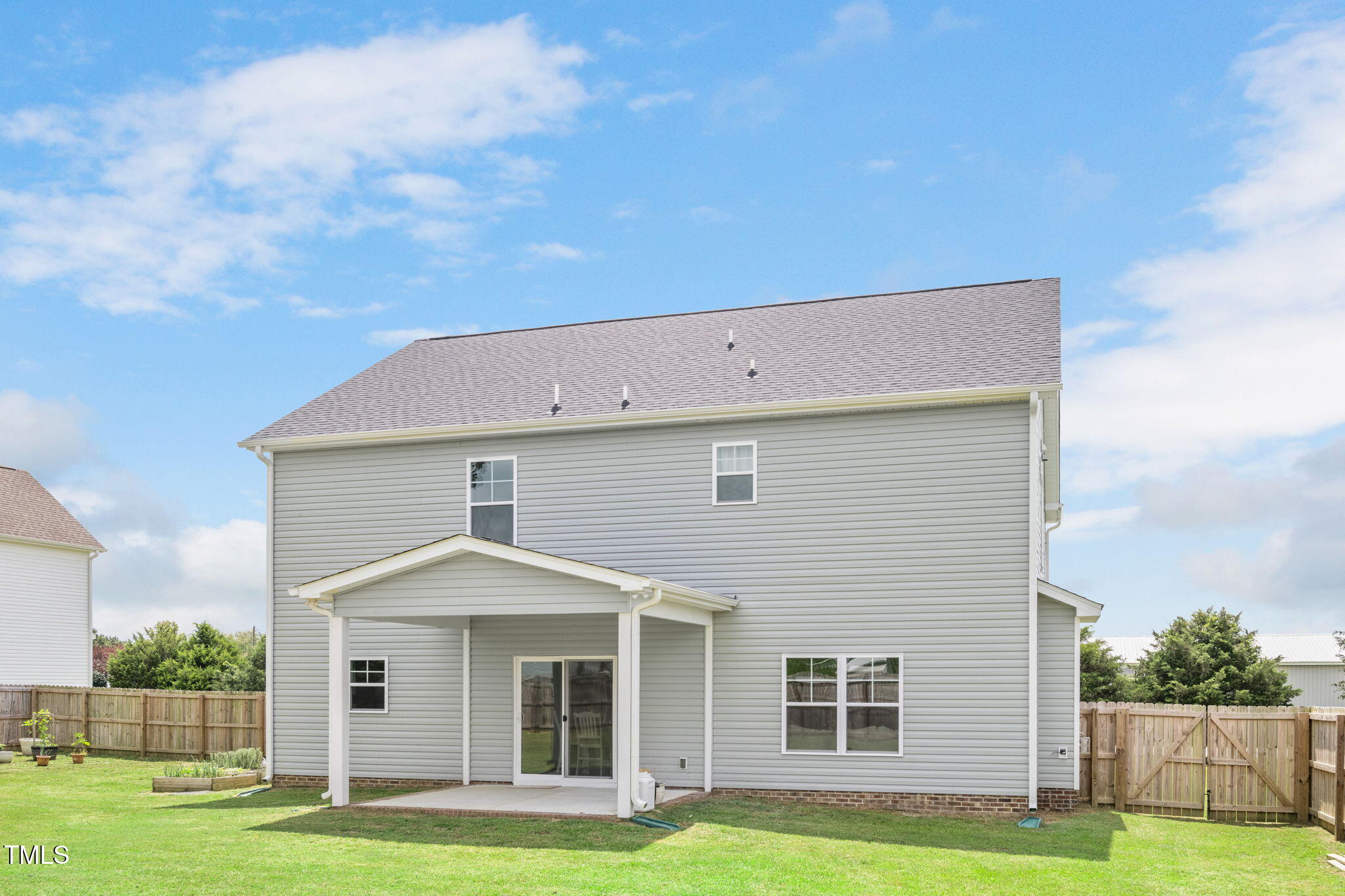 40 Kenbridge Lane Princeton, NC 27569 - Photo 32 of 36 a front view of a house with a yard