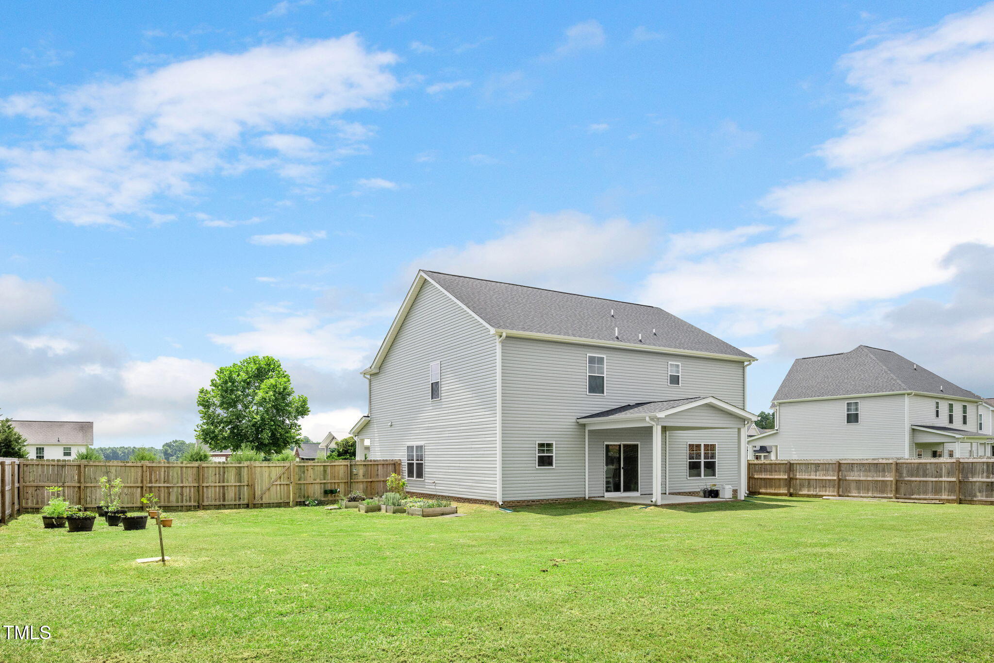 40 Kenbridge Lane Princeton, NC 27569 - Photo 33 of 36 a view of a house with a yard
