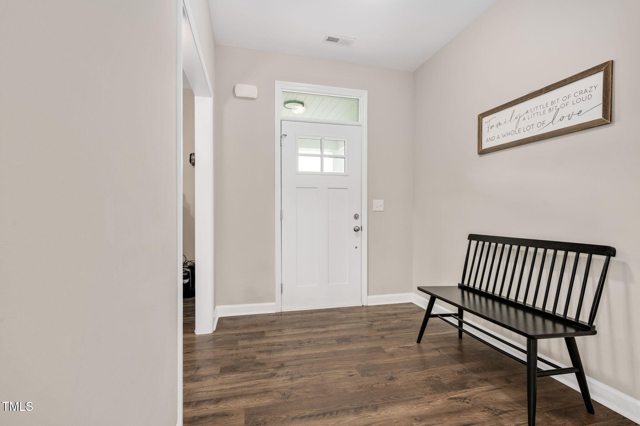 40 Kenbridge Lane Princeton, NC 27569 - Photo 6 of 36 a view of a hallway with wooden floor and a bedroom