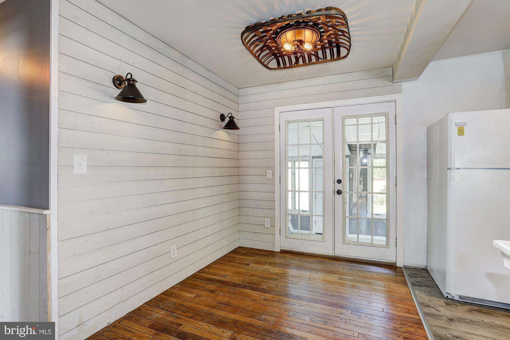 1818 Benedict Road Westminster, MD 21157 - Photo 11 of 32 Shiplap Walls | Hardwood Floors