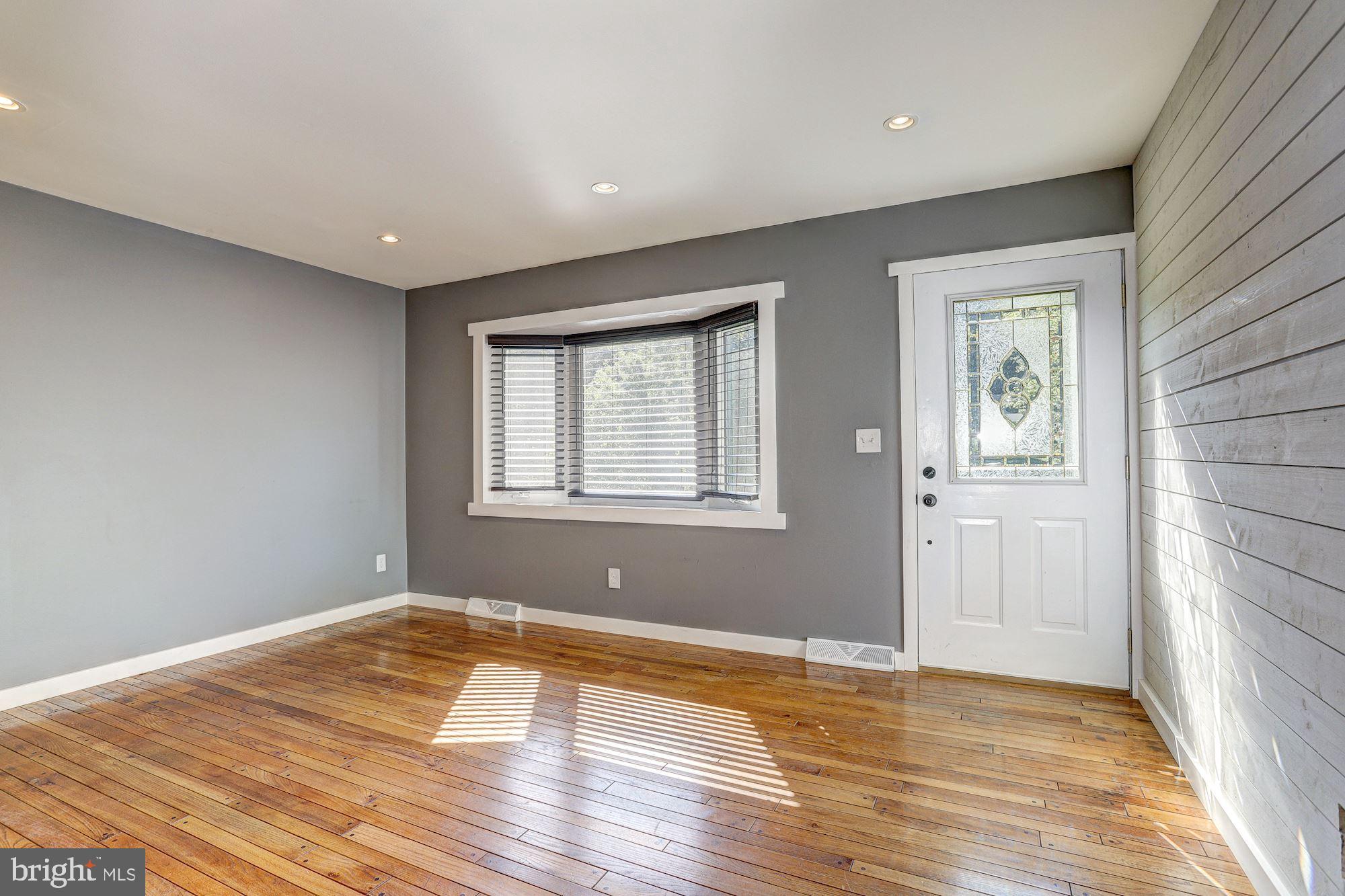 1818 Benedict Road Westminster, MD 21157 - Photo 3 of 32 Living Room | Hardwood Floors | Bow Window