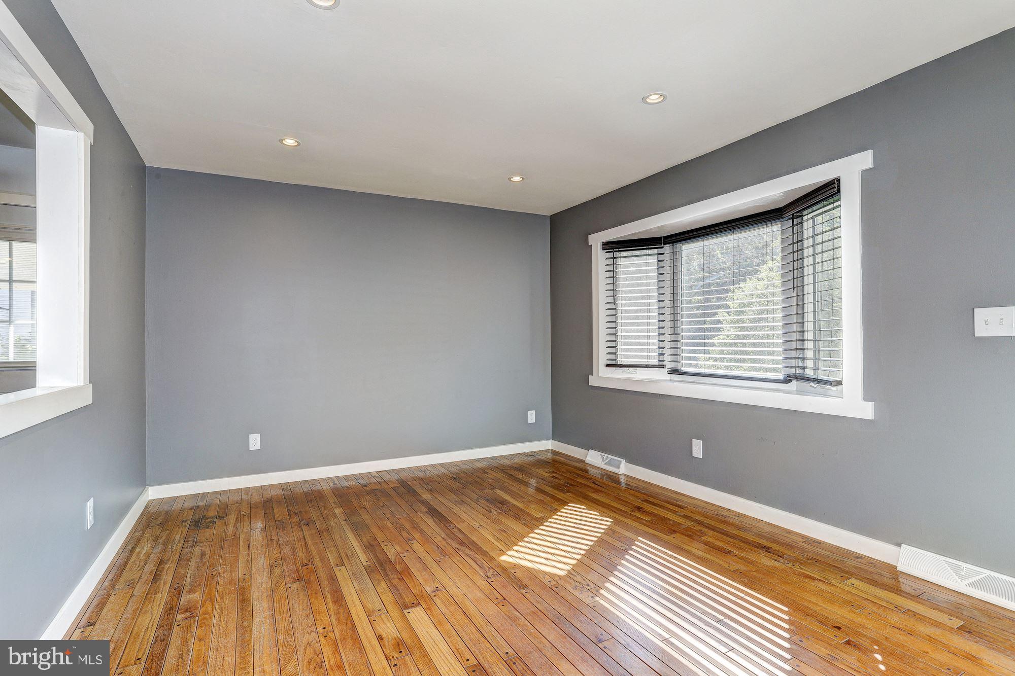 1818 Benedict Road Westminster, MD 21157 - Photo 4 of 32 Living Room | Hardwood Floors | Bow WIndow