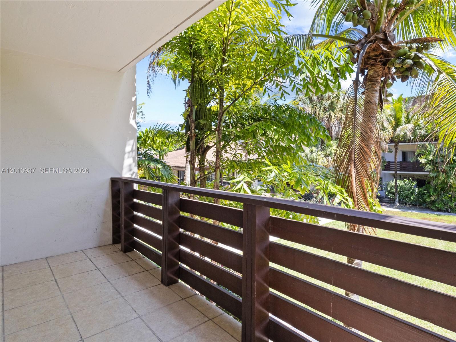 7487 Southwest 82nd Street, Unit C208 Miami, FL 33143 - Photo 21 of 28 a view of outdoor space with seating