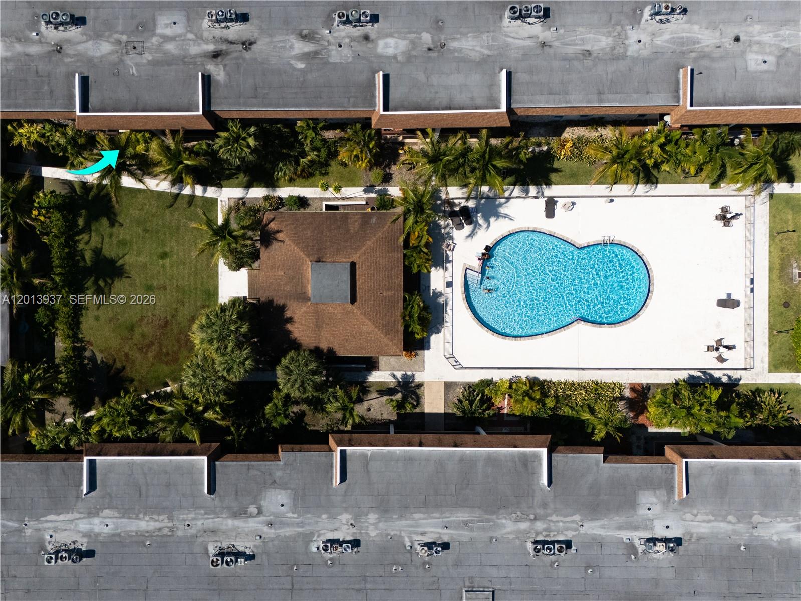 7487 Southwest 82nd Street, Unit C208 Miami, FL 33143 - Photo 23 of 28 an aerial view of a house with a swimming pool