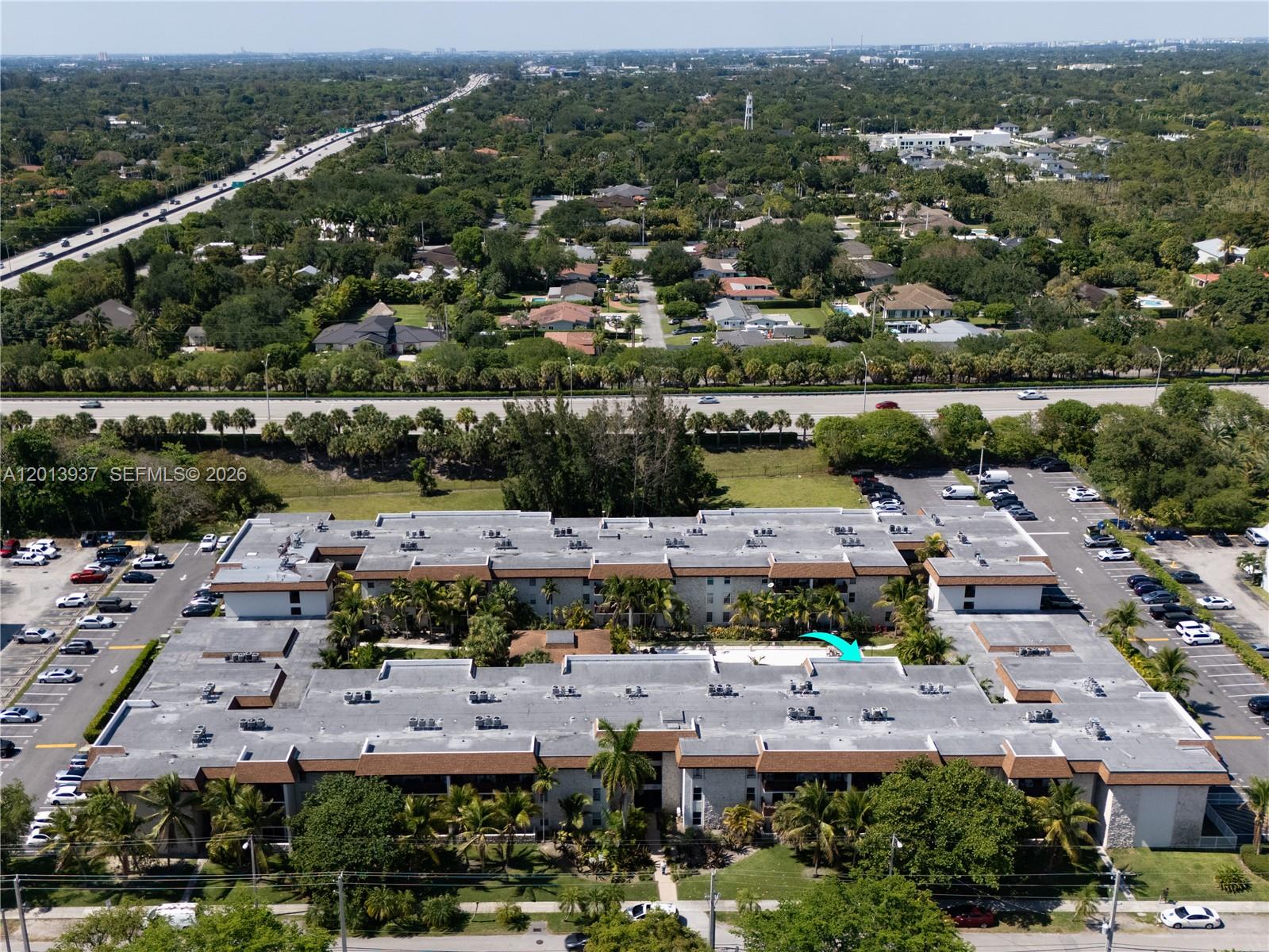 7487 Southwest 82nd Street, Unit C208 Miami, FL 33143 - Photo 25 of 28 an aerial view of a city with lots of residential buildings