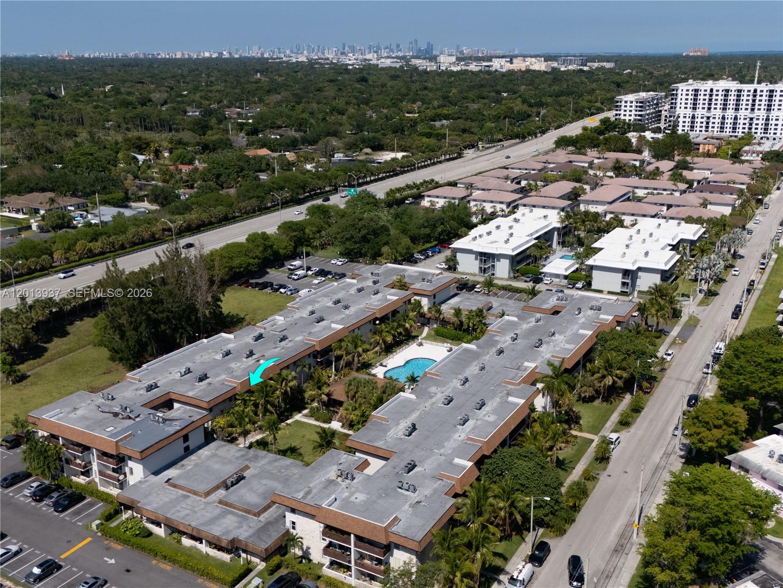 7487 Southwest 82nd Street, Unit C208 Miami, FL 33143 - Photo 27 of 28 an aerial view of multiple house