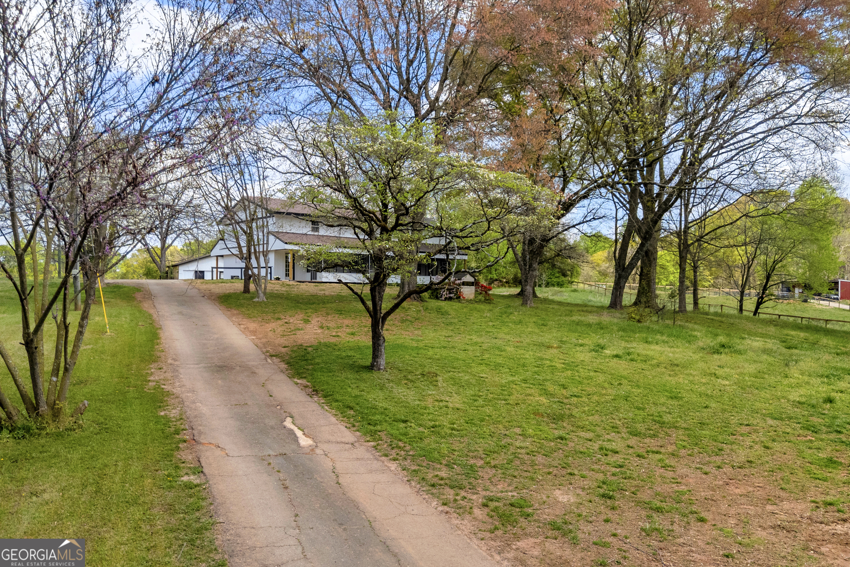 8606 Holly Springs Road Maysville, GA 30558 - Photo 19 of 74 a view of a park with large trees