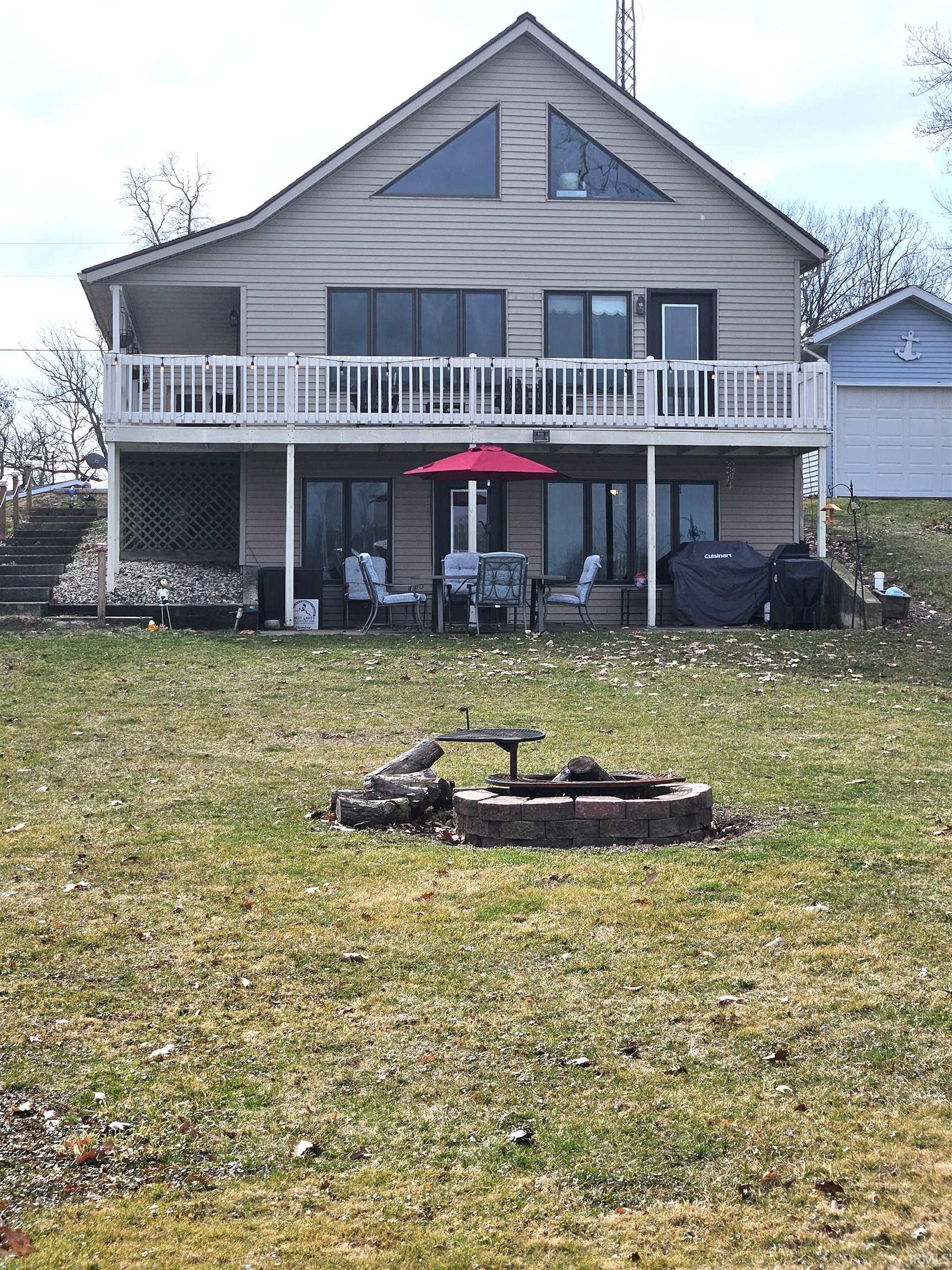 9901 North Eagle Island Road Rome City, IN 46784 - Photo 1 of 29 Gallery Image 1