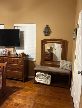 a view of a workspace with furniture and toys