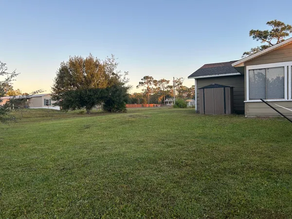 a view of outdoor space and yard