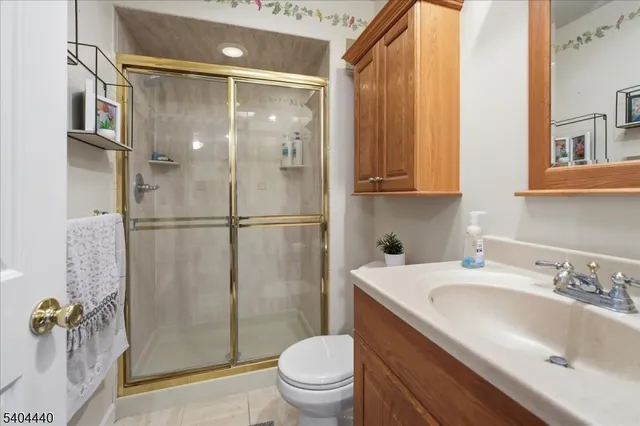 a view of a chairs and table in the patio and a patio