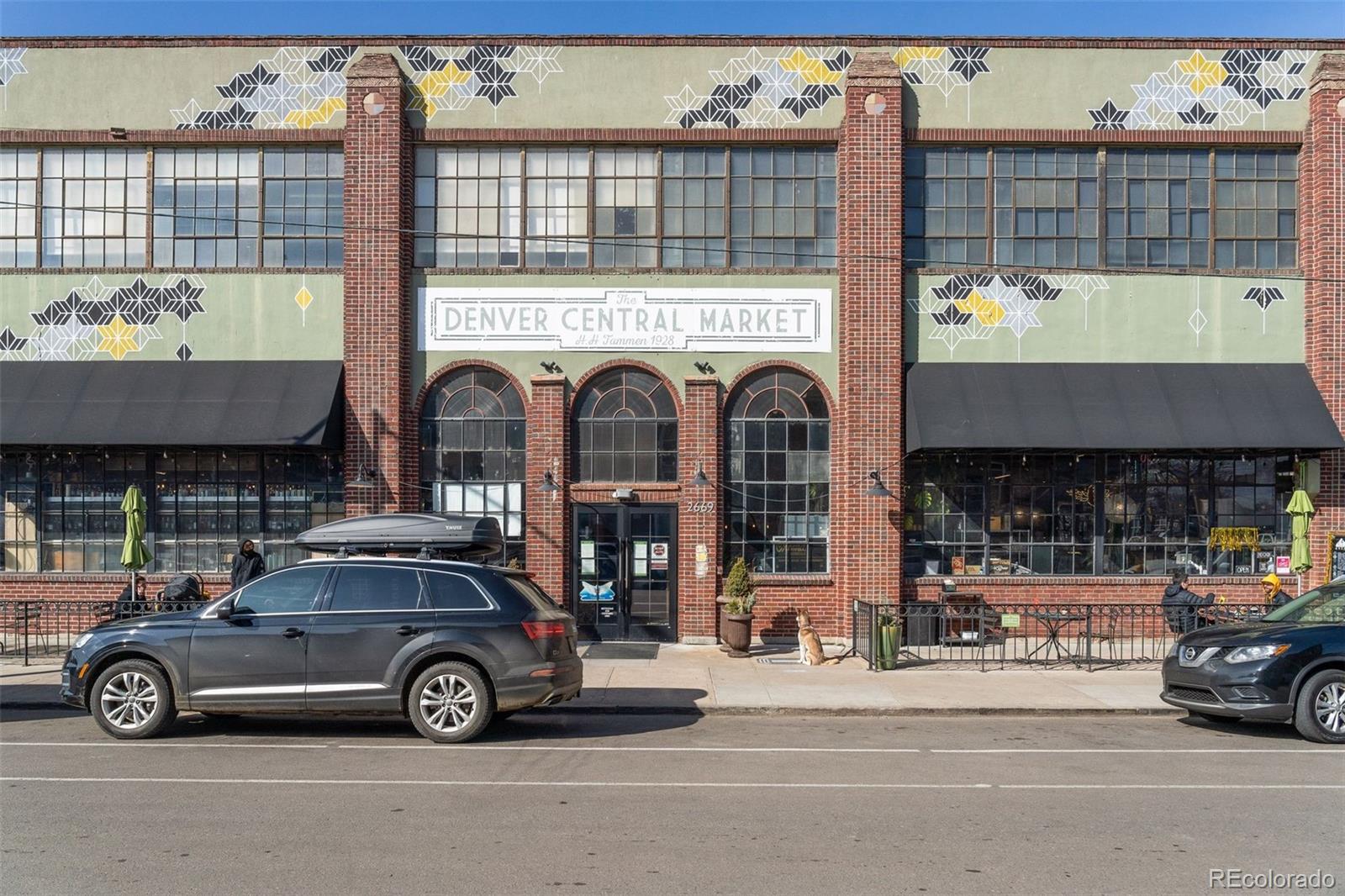 2245 Blake Street, Unit C Denver, CO 80205 - Photo 39 of 40 a car parked in front of a building