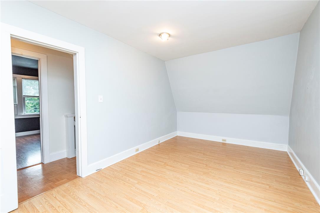 280 Oak Road Bangor, PA 18013 - Photo 19 of 52 Gleaming wood floors and a sloped ceiling create character in this light-filled upper-level room.