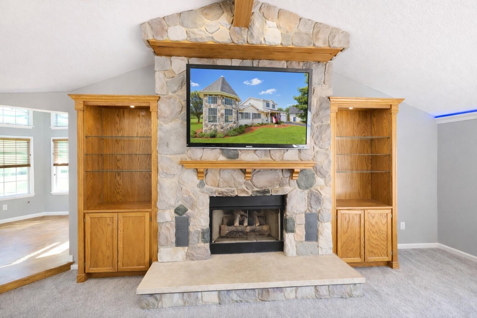 6640 Wolf Lake Road Jackson, MI 49201 - Photo 5 of 22 fireplace with front on TV