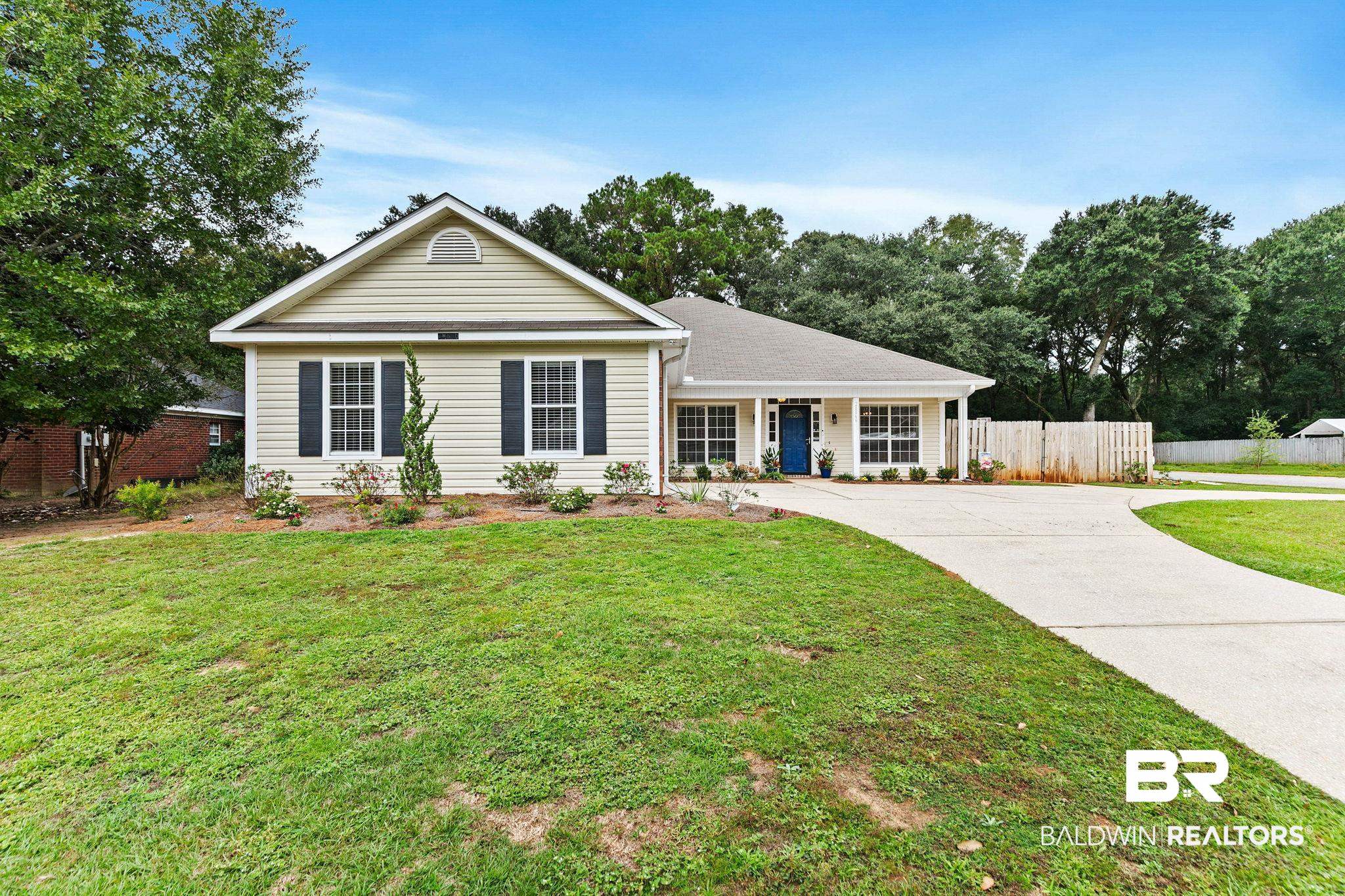 28866 Canterbury Road Daphne, AL 36526 - Photo 1 of 88 Ranch-style house featuring driveway and a porch
