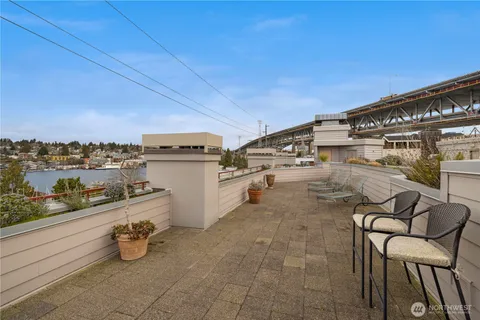 a view of a terrace with chairs