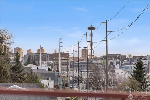 a view of a city with tall buildings