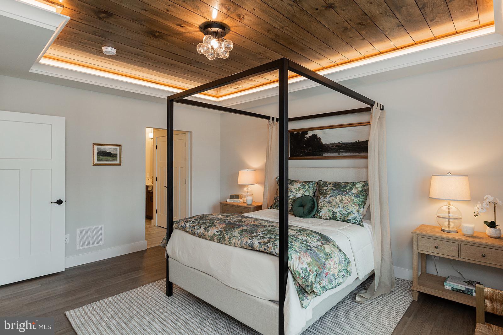 618 Greenbriar Path Cochranville, PA 19330 - Photo 24 of 49 a bedroom with a bed and a mirror