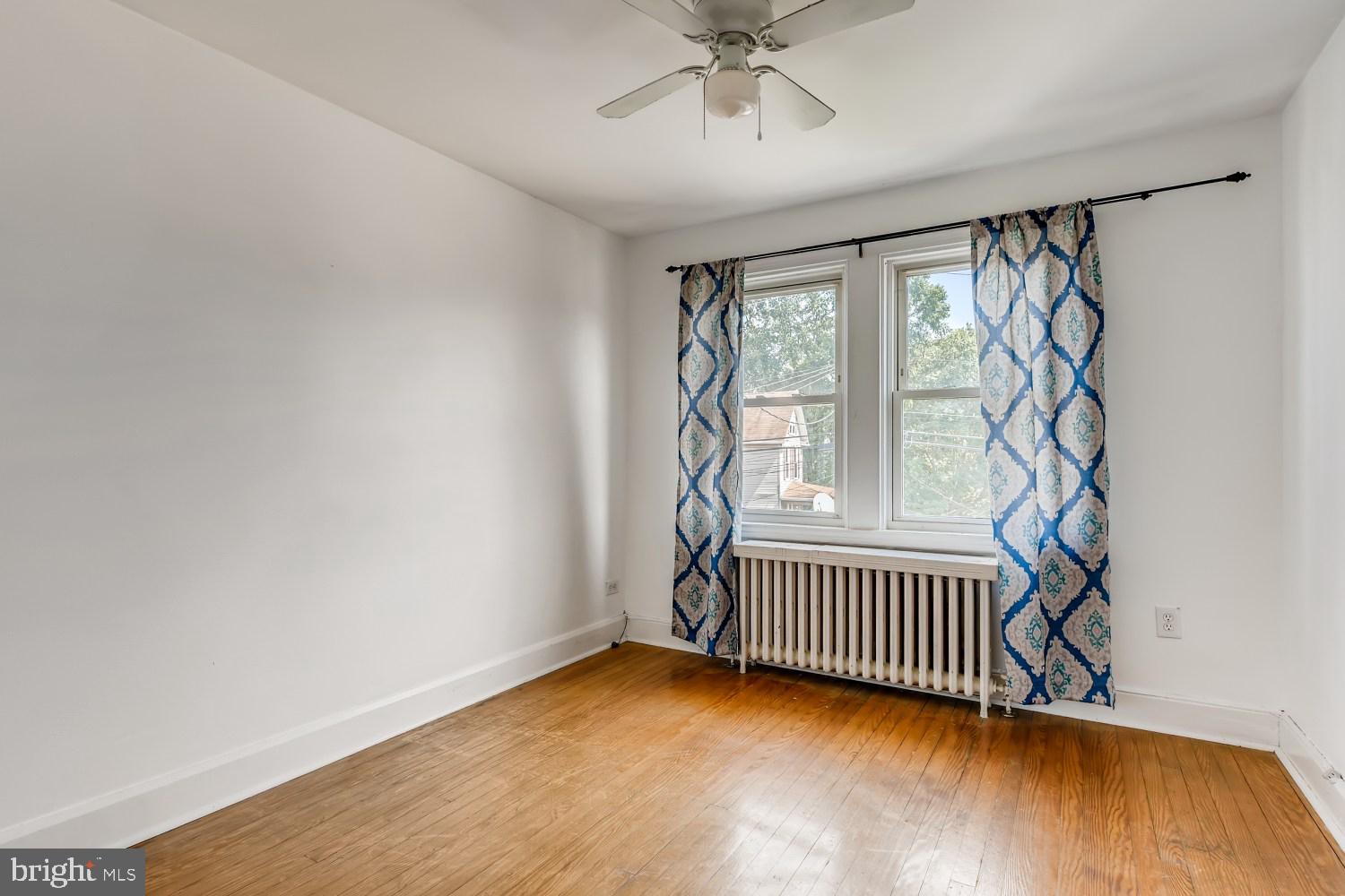 7103 Harford Road Baltimore, MD 21234 - Photo 19 of 27 a view of an empty room and window