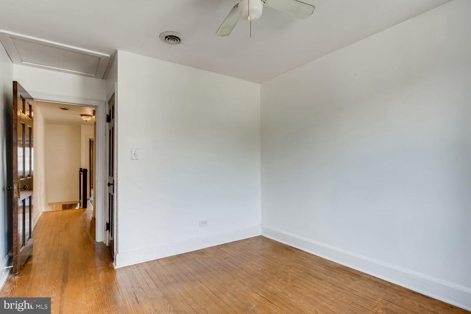 7103 Harford Road Baltimore, MD 21234 - Photo 20 of 27 a view of a bathroom with wooden floor