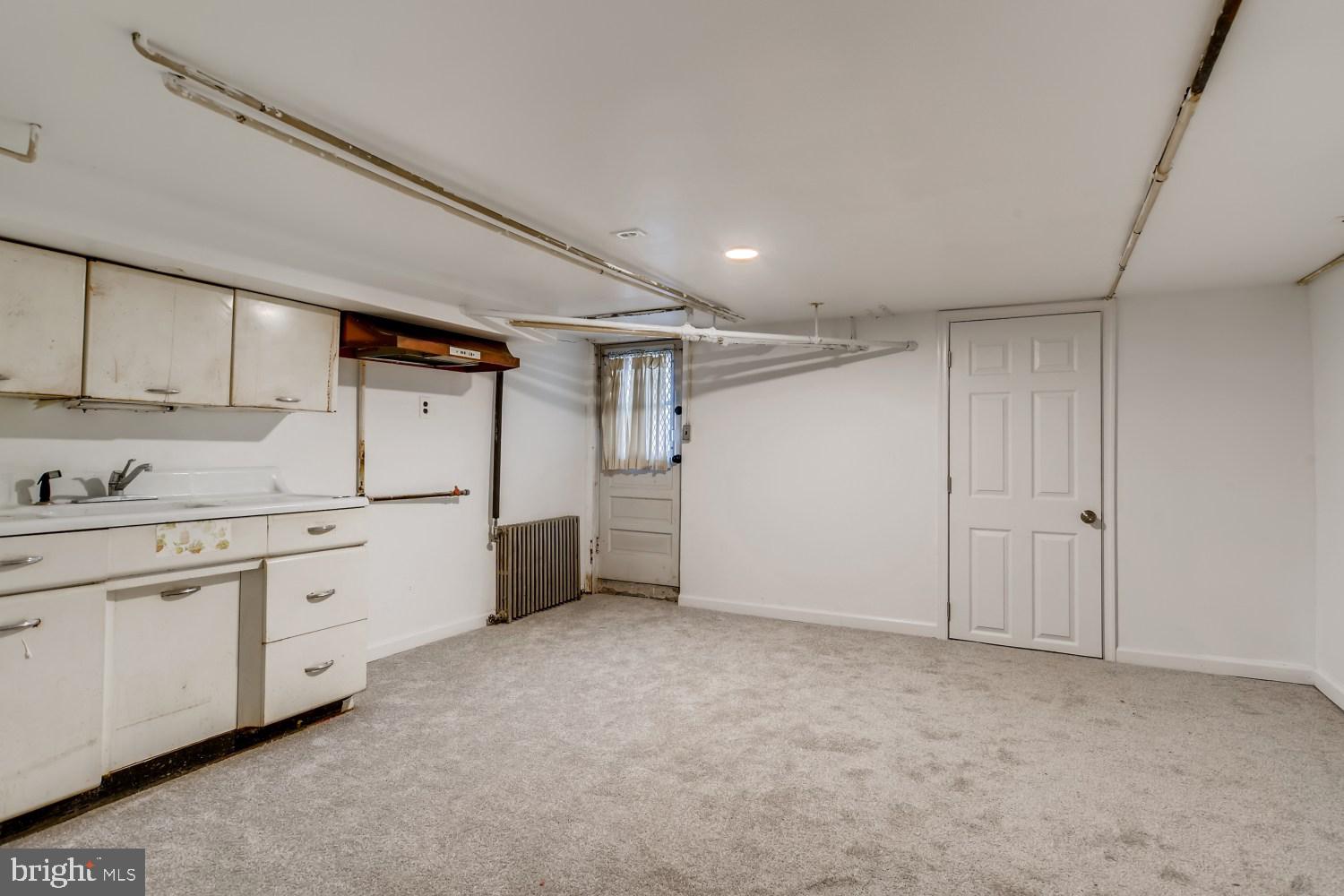 7103 Harford Road Baltimore, MD 21234 - Photo 23 of 27 a view of a kitchen with cabinets