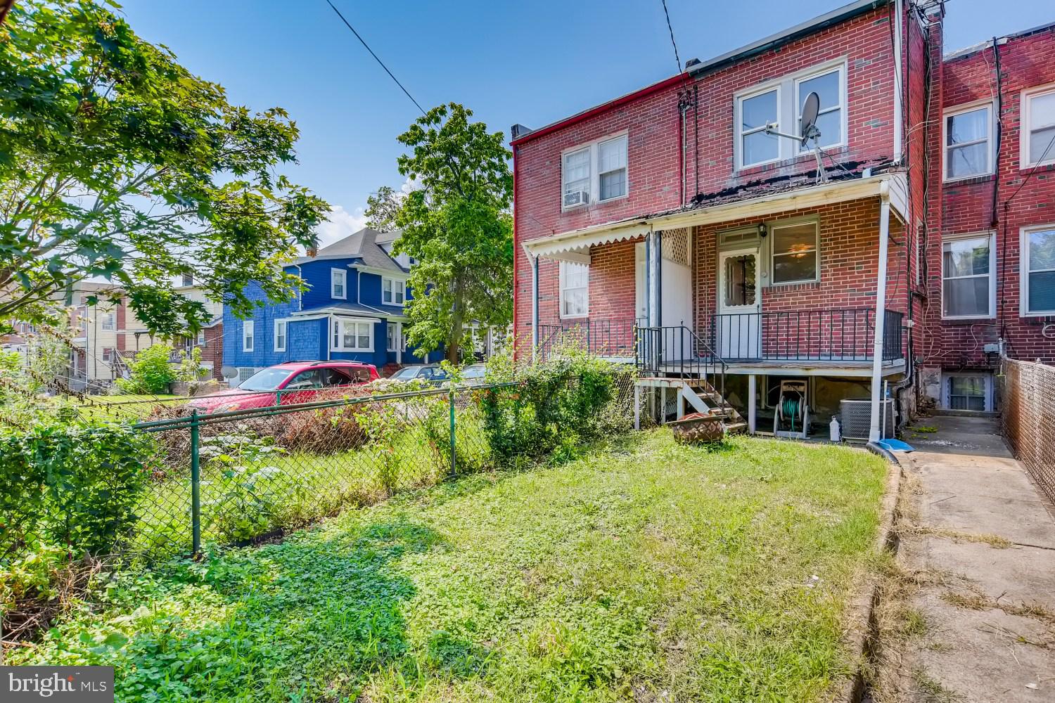 7103 Harford Road Baltimore, MD 21234 - Photo 26 of 27 a view of a house with a yard porch and sitting area