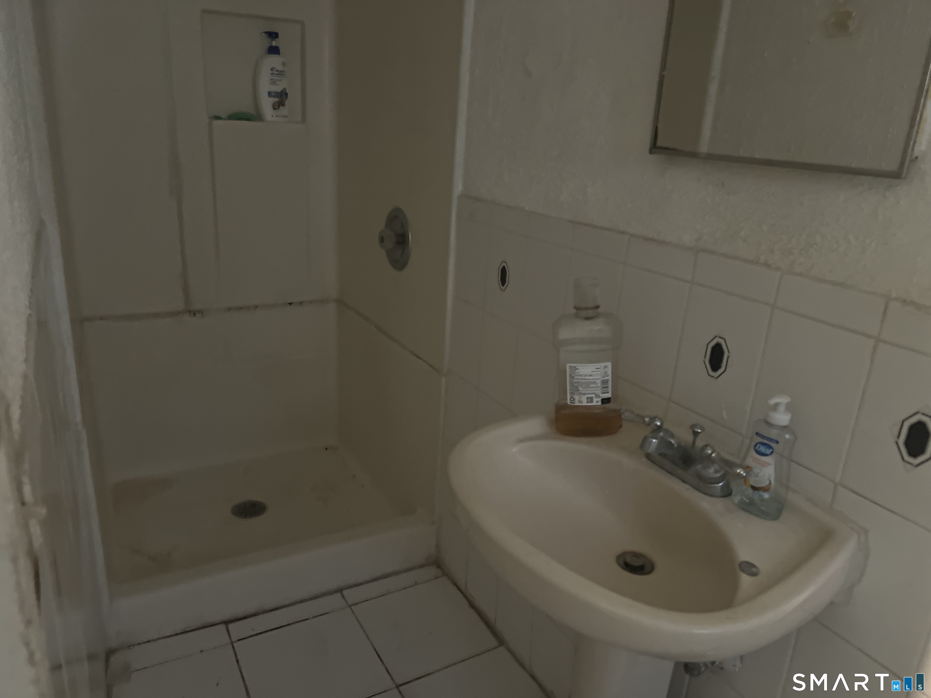 275 Long Ridge Road Stamford, CT 06905 - Photo 31 of 40 a bathroom with a sink and a mirror