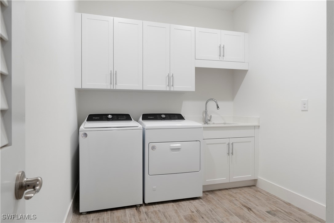16245 Wax Myrtle Street Punta Gorda, FL 33982 - Photo 7 of 22 a view of cabinets and wooden floor
