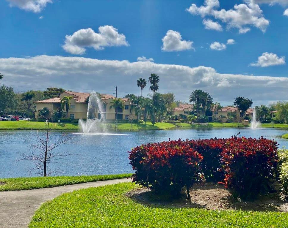 1247 Southwest 46th Avenue, Unit 1301 Pompano Beach, FL 33069 - Photo 21 of 22 a view of a lake with a outdoor space