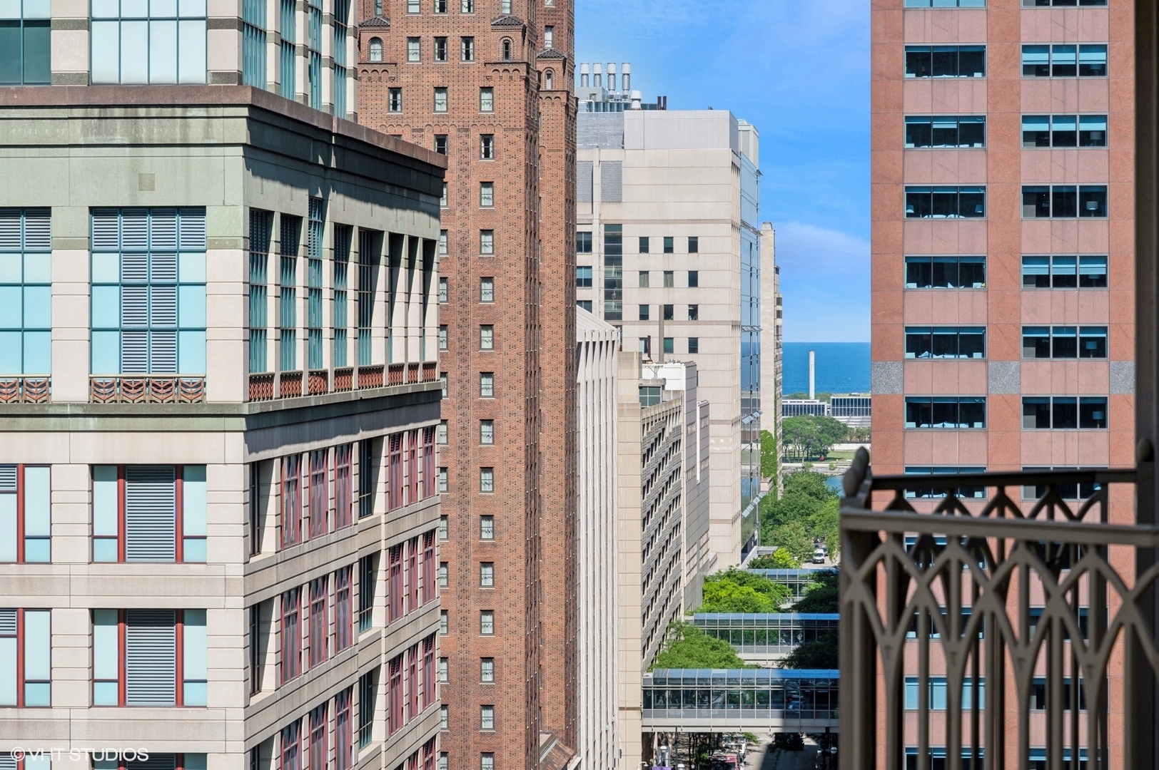 21 East Huron Street, Unit 1407 Chicago, IL 60611 - Photo 12 of 23 a front view of a large building with a street