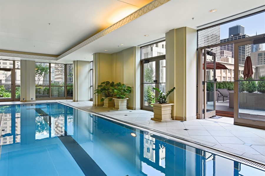 21 East Huron Street, Unit 1407 Chicago, IL 60611 - Photo 14 of 23 a room with sink and large window