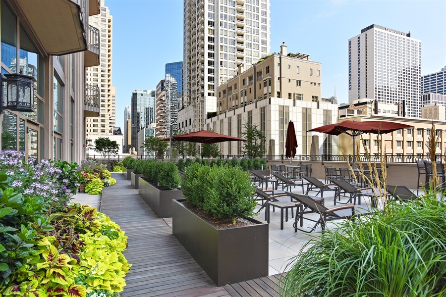 21 East Huron Street, Unit 1407 Chicago, IL 60611 - Photo 17 of 23 a view of a city with tall buildings