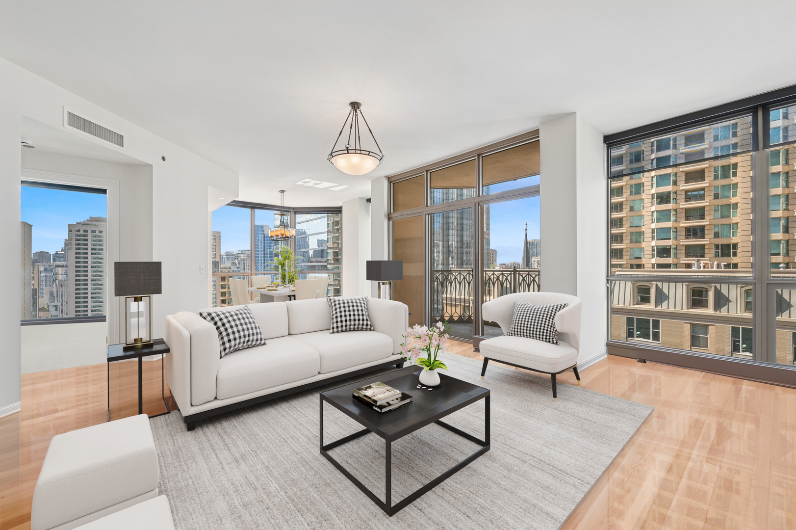 21 East Huron Street, Unit 1407 Chicago, IL 60611 - Photo 2 of 23 a living room with furniture and a large window