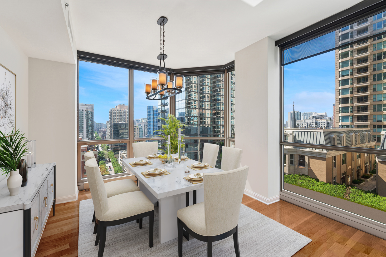 21 East Huron Street, Unit 1407 Chicago, IL 60611 - Photo 4 of 23 a view of a dining room with furniture window and wooden floor