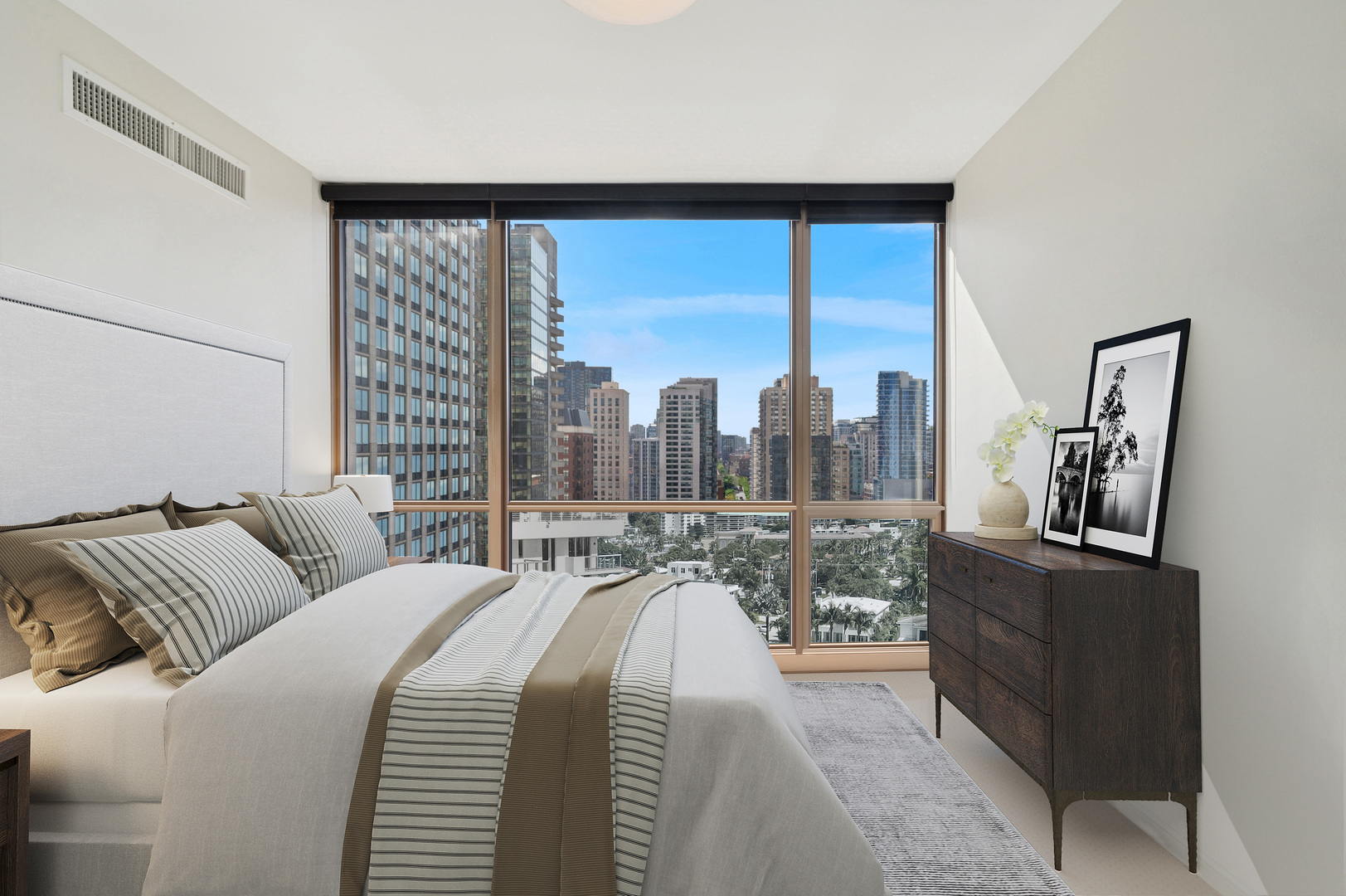 21 East Huron Street, Unit 1407 Chicago, IL 60611 - Photo 6 of 23 a view of a balcony with furniture and a large window