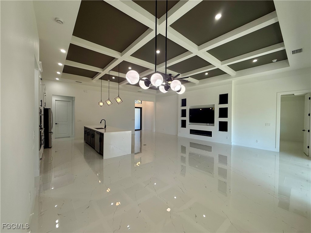 2909 10th Street West Lehigh Acres, FL 33971 - Photo 7 of 31 a view of a livingroom with a flat screen tv