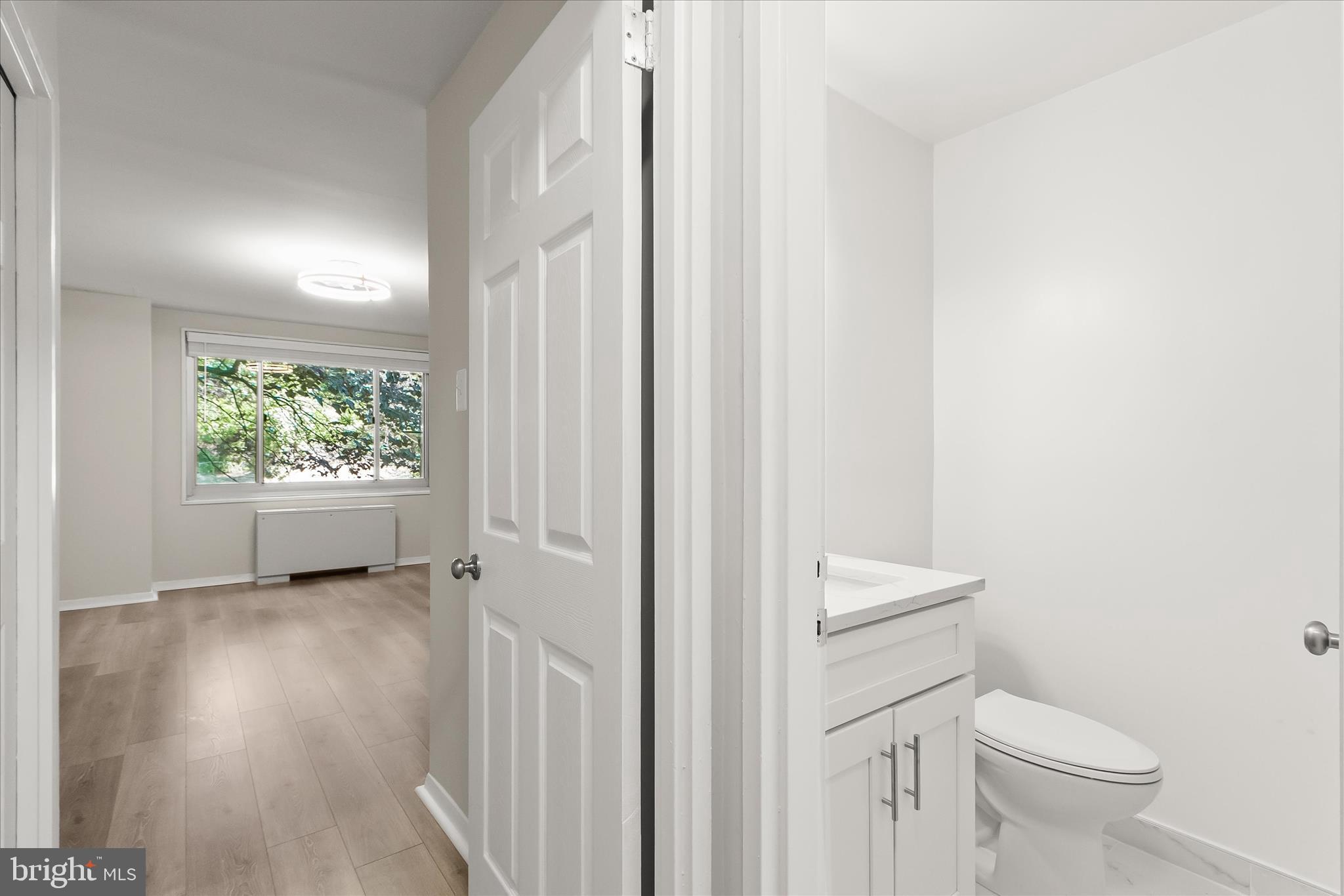 1900 Lyttonsville Road, Unit 216 Silver Spring, MD 20910 - Photo 18 of 36 a bathroom with a toilet