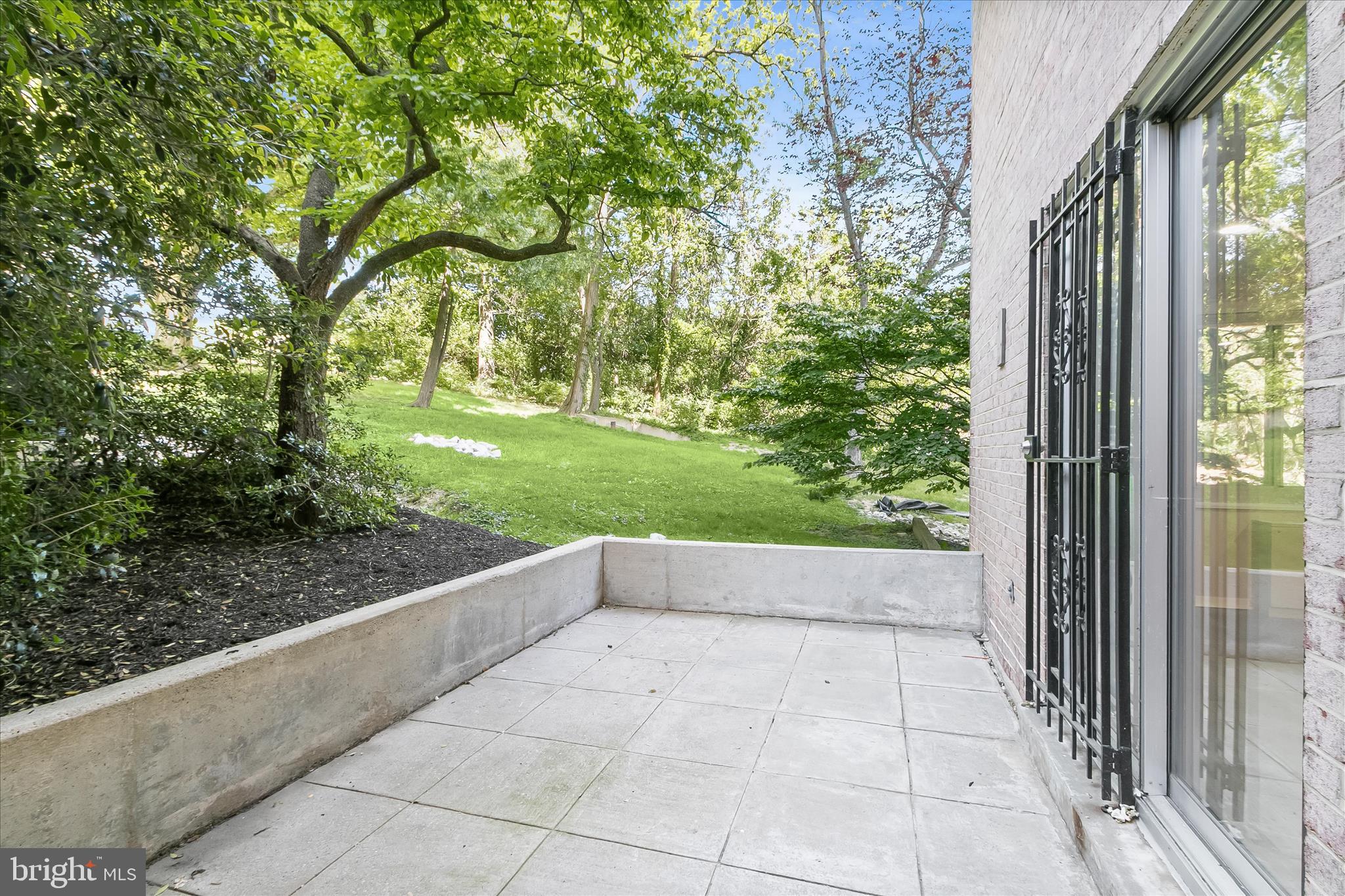 1900 Lyttonsville Road, Unit 216 Silver Spring, MD 20910 - Photo 10 of 36 a view of backyard with green space