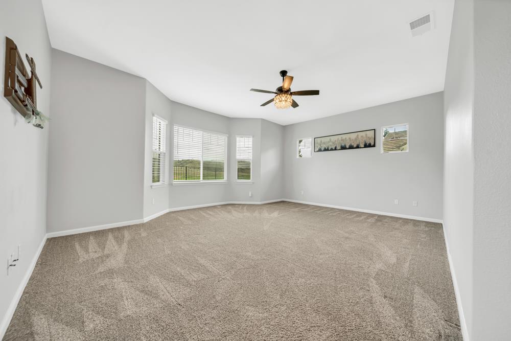 20300 Panoz Road Patterson, CA 95363 - Photo 14 of 61 a view of an empty room with a window