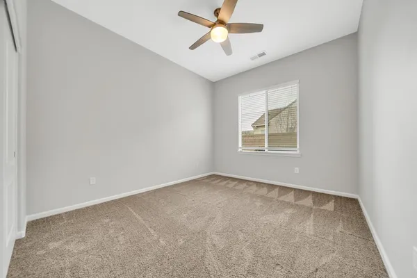 a view of a livingroom with a flat screen tv