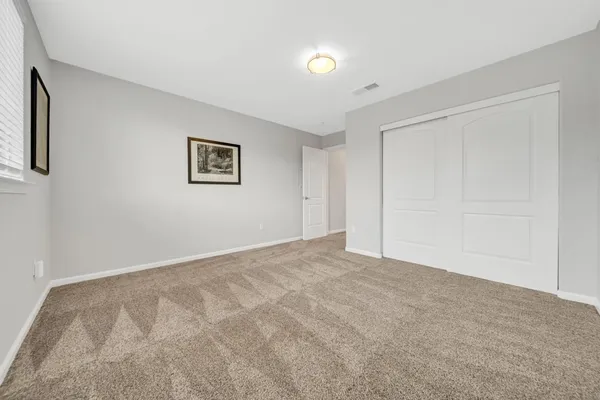 a view of a room with windows
